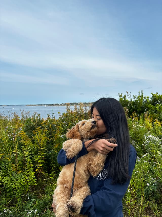 Emily and her mini goldendoodle Hazel